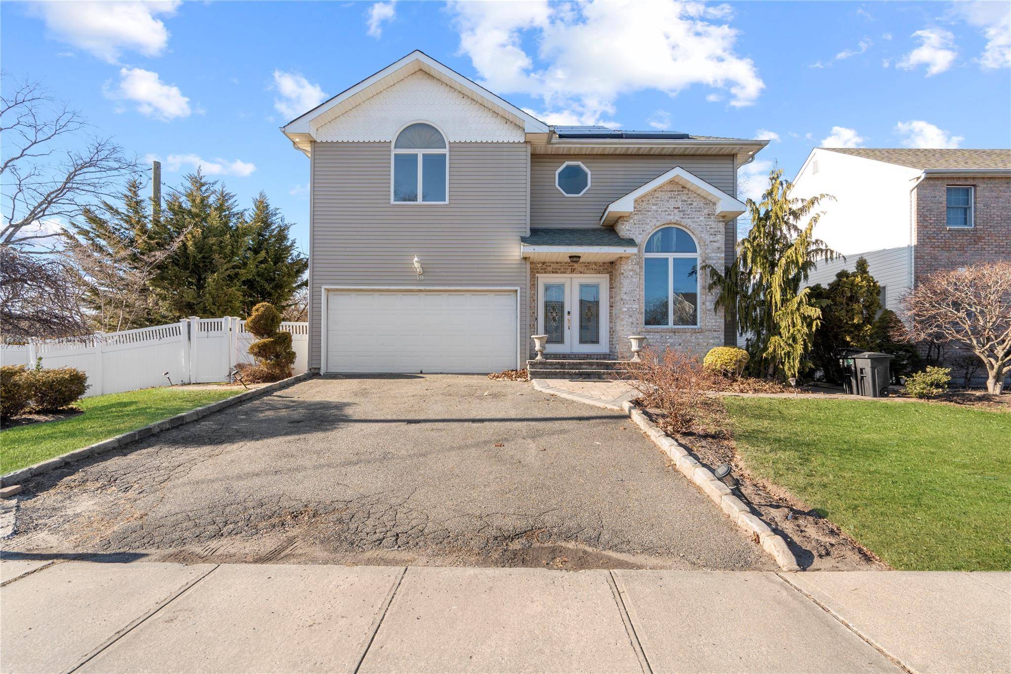 Welcome to 19 Howard Court in Plainview a stunning, newly renovated retreat set on a private court.