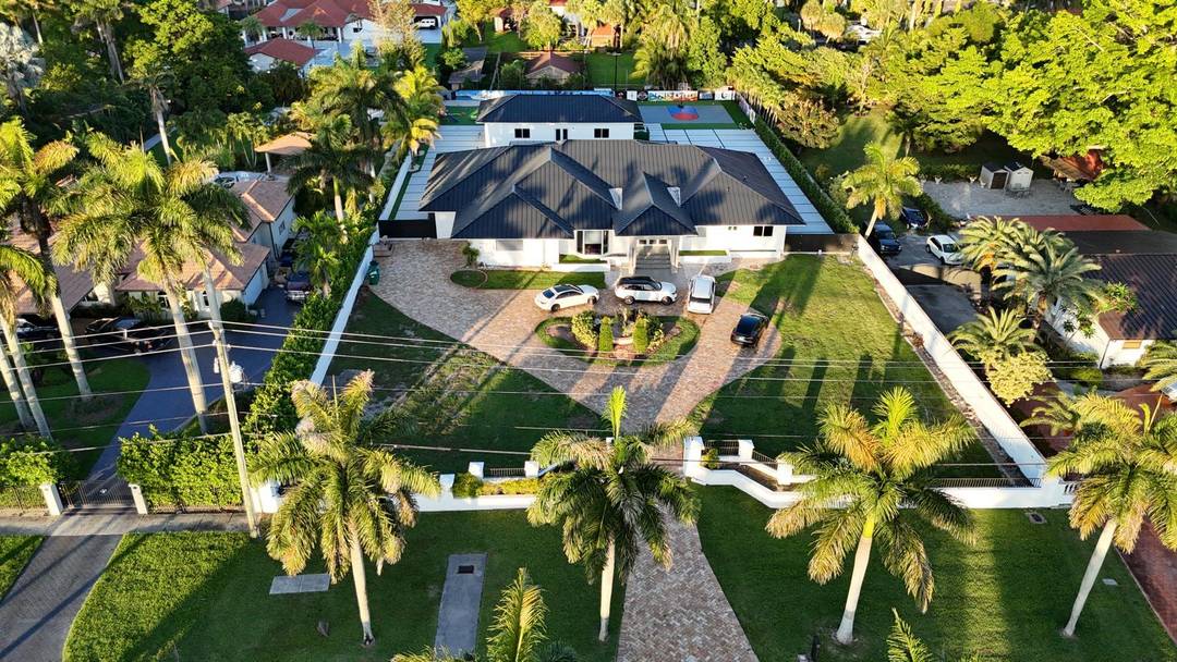 Stunning Mediterranean style residence on nearly 1 acre, all on one level.