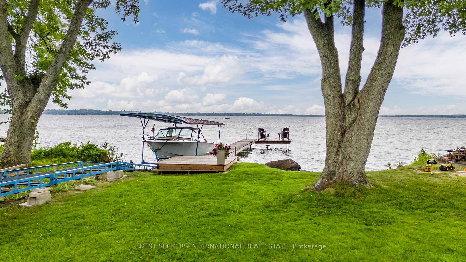 Rare 69 feet of pristine waterfront frontage on Lake Simcoe in Cooks Bay !