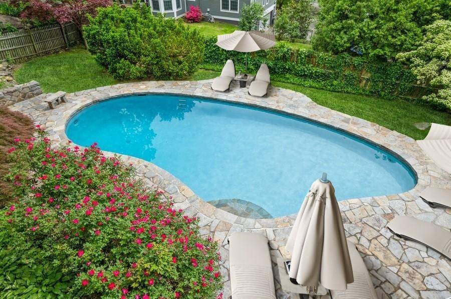 Beautifully expanded and updated Colonial at the end of a quiet cul de sac.
