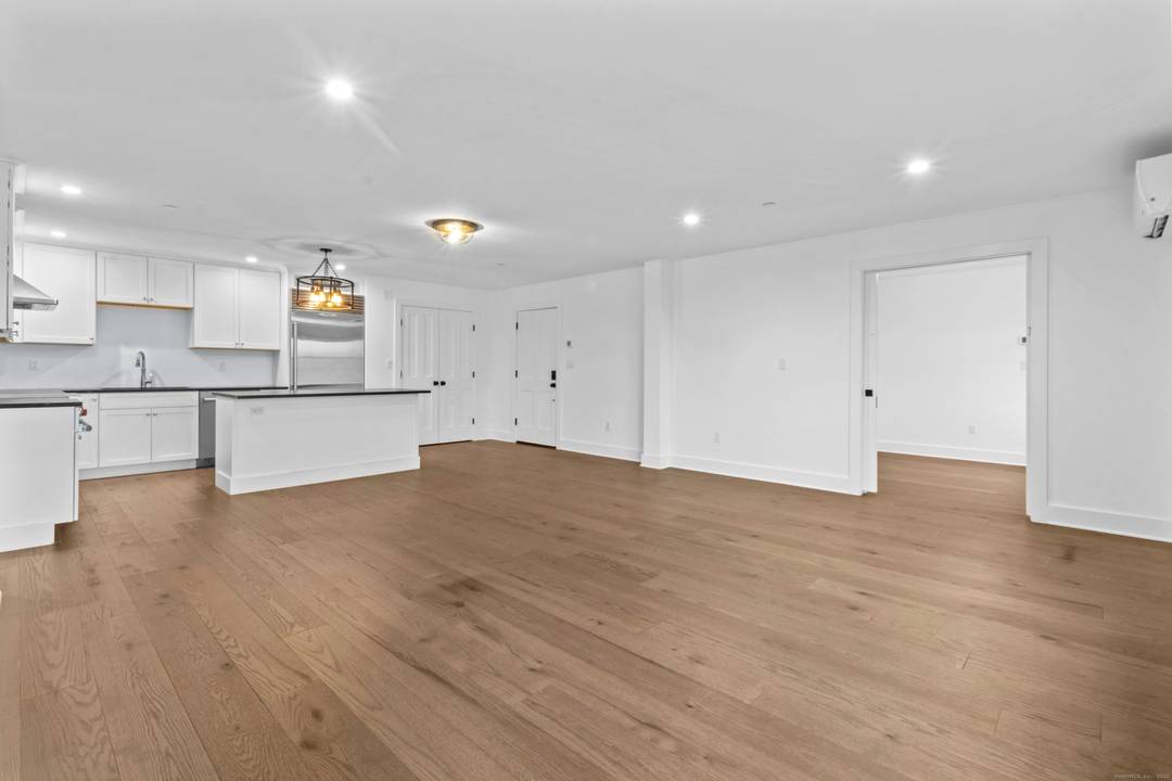 Discover modern living in the heart of Mystic with this stunning 2 bedroom, 1 bathroom condo.