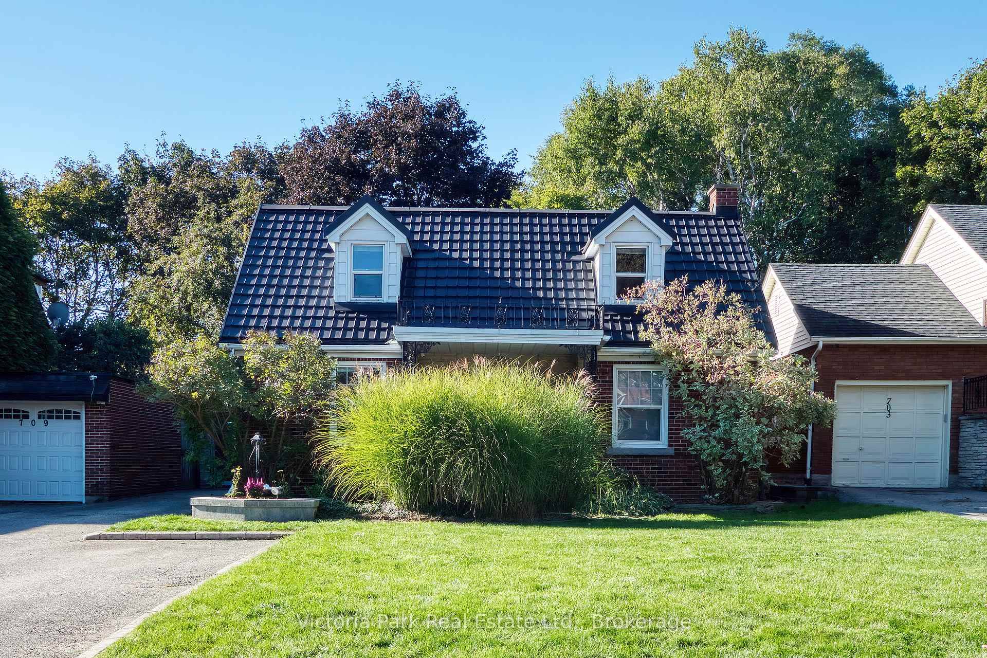 Welcome home to the coveted Rockway Drive with its collection of beautiful historic homes, estate lots, mature trees, and beautiful gardens !