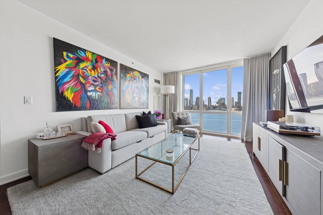 Enjoy spectacular Hudson River views and unforgettable sunsets from this sundrenched, fully furnished 863 sq.