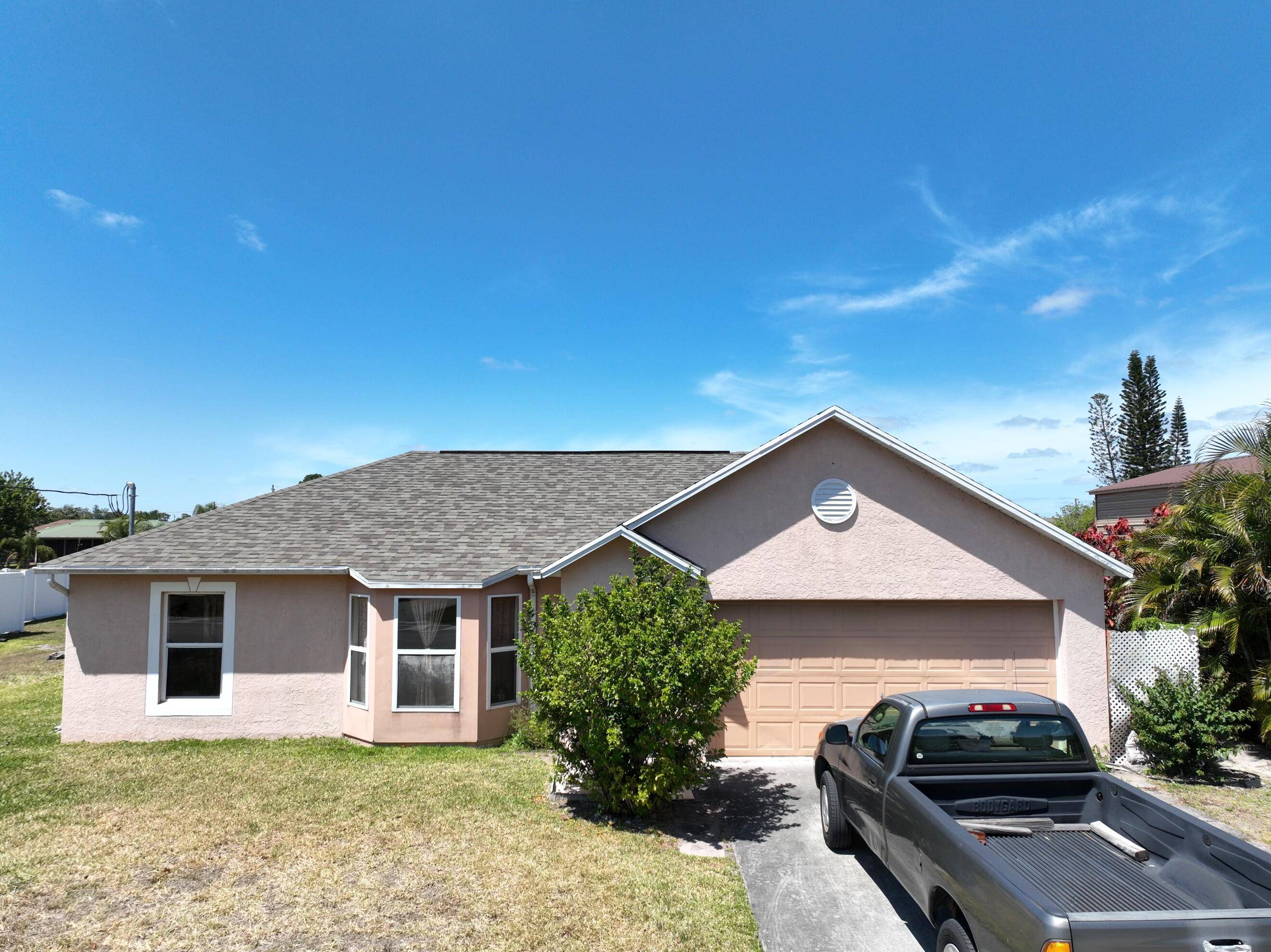 Welcome to this three bedroom, two bathroom residence tucked away in Southwest Port Saint Lucie.