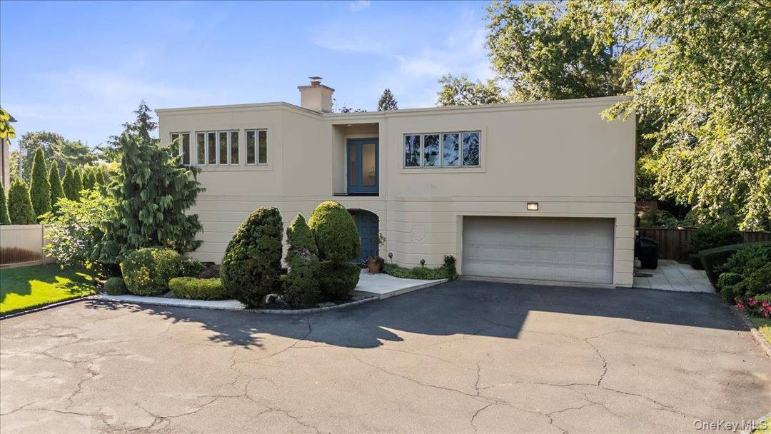 Step into this beautiful, romantic side hall Colonial, where timeless elegance meets modern comfort.