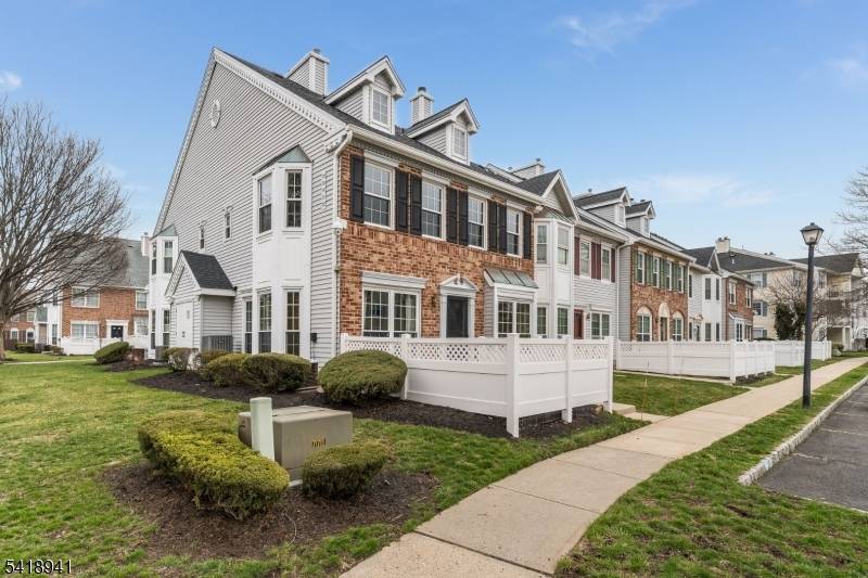 Natural light abounds in this sun drenched end unit in the highly sought after community of Governor's Pointe !