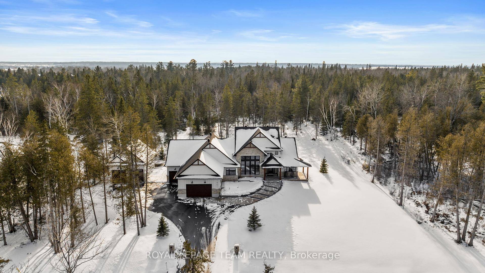 Set on a picturesque 2 acre lot, this exceptional estate with over 3700 square feet above grade, seamlessly blends modern sophistication with the tranquility of nature.