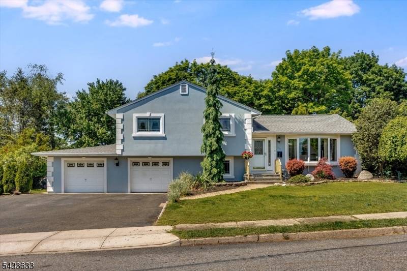 Step into this beautifully customized home, where thoughtful design and ample space meet !