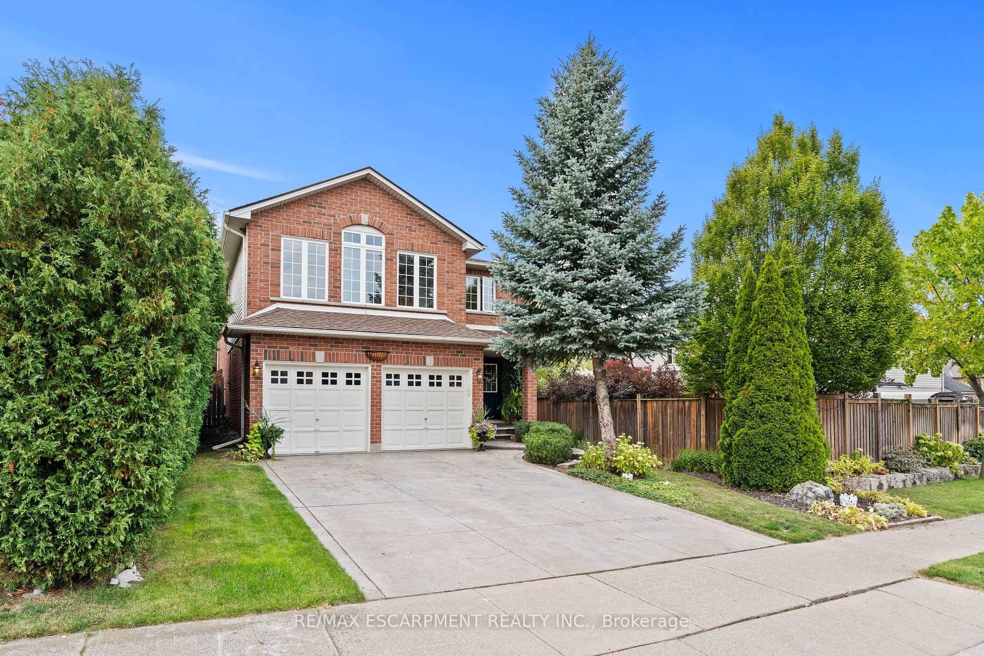 Welcome to 251 Hawkswood Trail a beautifully maintained home, lovingly cared for by its original owner, offering over 3, 300 sq.