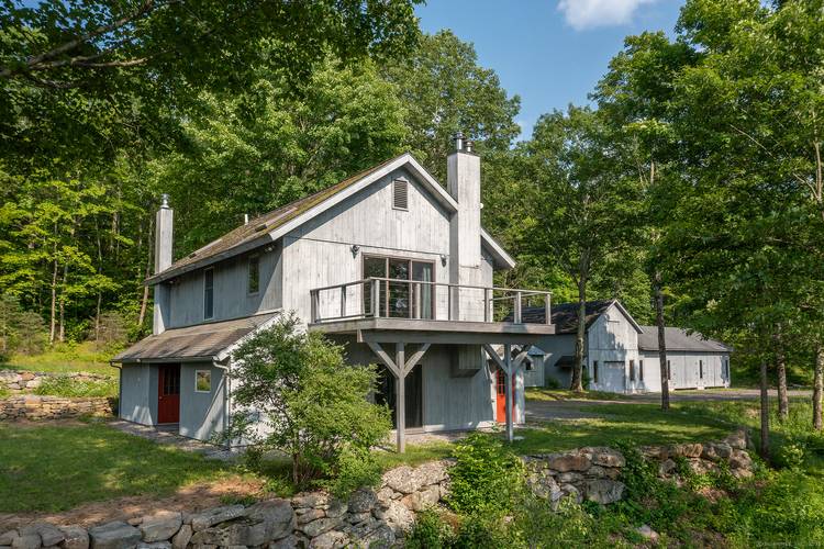 Incredible opportunity in Kent featuring breathtaking westerly views and over 50 acres of land.