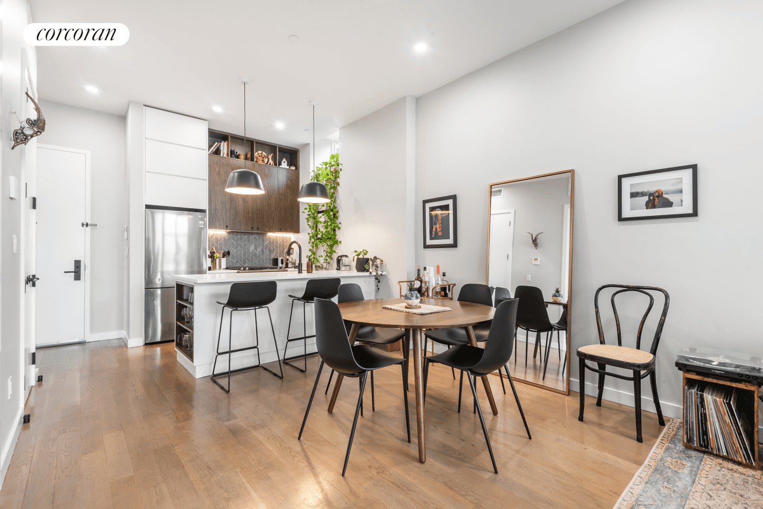 On the third floor of a recently constructed four story walk up, Apartment 3B is a large and inviting home designed by award winning architecture and interior design firm, StudiosC.