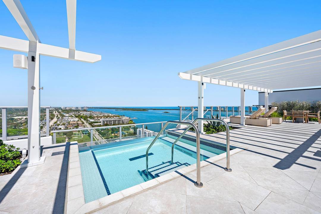 High floor residence at Nautilus 220 offering rare dual water views of the Intracoastal and Atlantic.