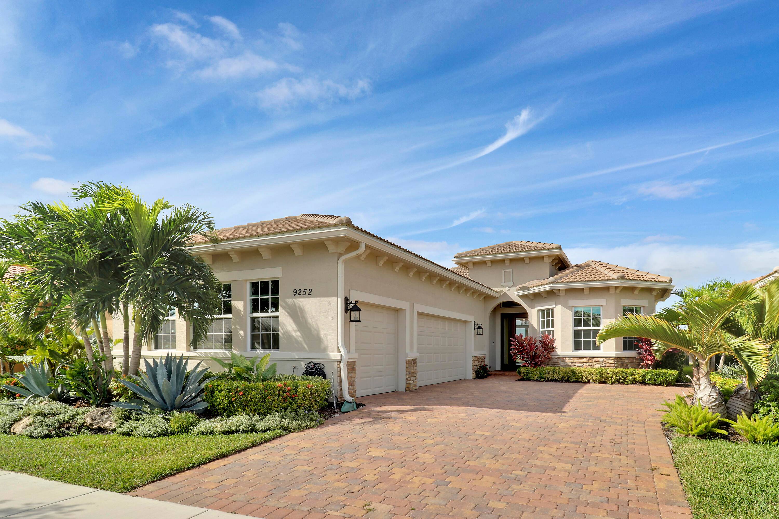 DEEP LAKE FRONT LOT ON A CUL DE SAC WITH A SPACIOUS, FENCED BACK YARD AND A THREE CAR GARAGE IN THE RESORT STYLE 55 NEIGHBORHOOD OF CRESSWIND AT VERANO ...