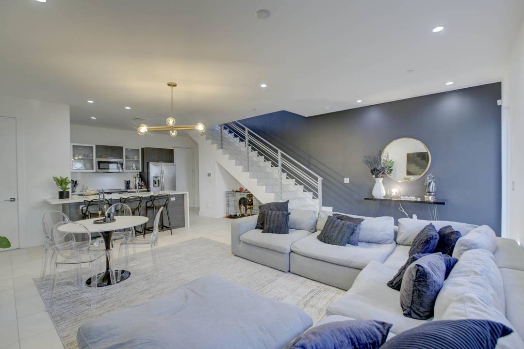 Rarely available CORNER FIRST amp ; 2ND FLOOR townhouse at the end of the street, with fenced in private front yard !