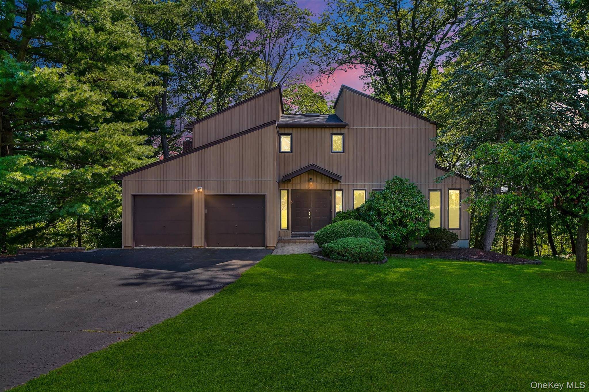 Welcome to this stunning 4 bedroom Colonial Contemporary tucked away on a quiet cul de sa.