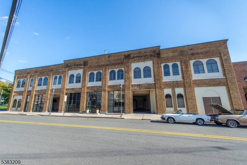 Fully renovated loft with 11' ceilings and hardwood concrete flooring.