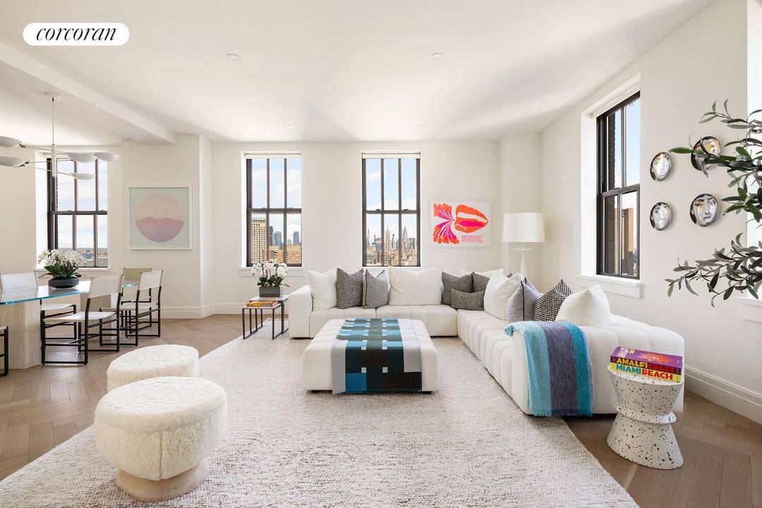 Architectural Legacy Meets Extraordinary Potential in a Downtown Icon At offer are two adjacent, but presently unjoined, loft apartments that could be seamlessly melded to create a spectacular high floor ...