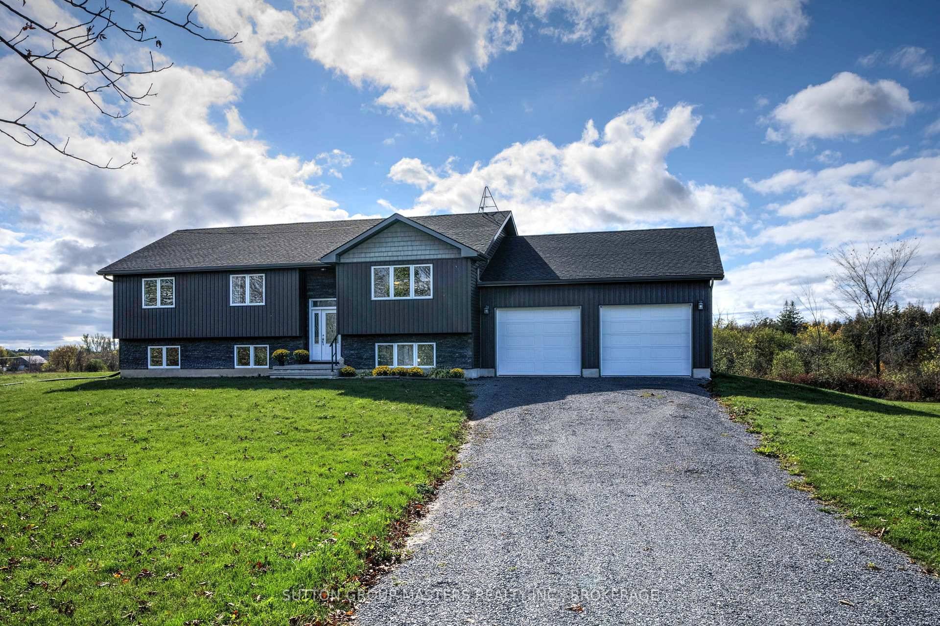 Beautiful elevated bungalow situated on a private 2.