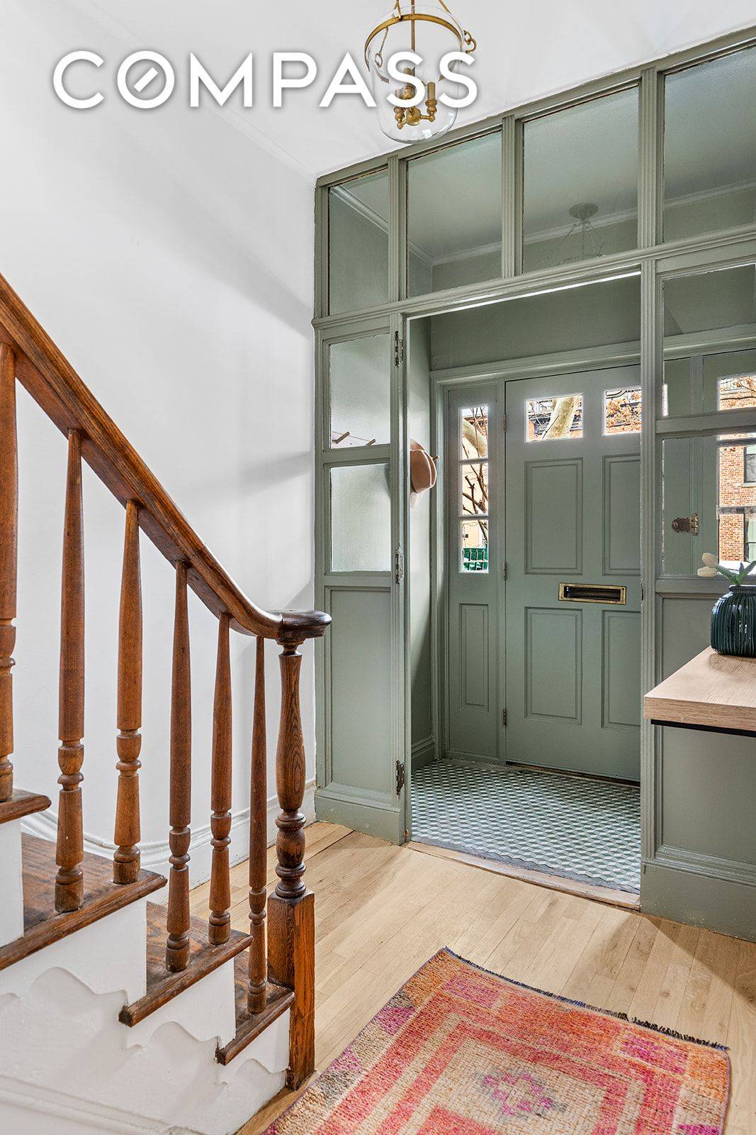 Discover the perfect harmony of old world charm and spacious living at 114 2nd Street a 20 foot wide, sun drenched carriage house in the heart of Carroll Gardens.