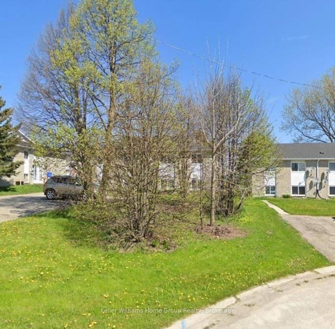 This spacious lower level apartment has been freshly updated, boasting natural light from many large windows throughout.