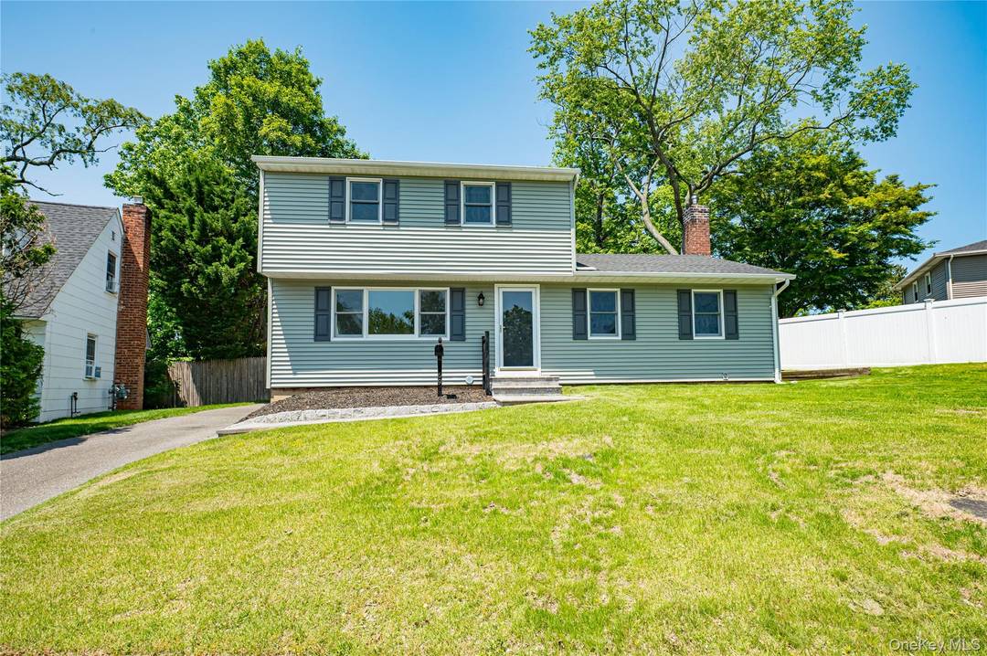 Newly Renovated 5 Bedroom 2 Bath Colonial With New Hardwood Floors Throughout.