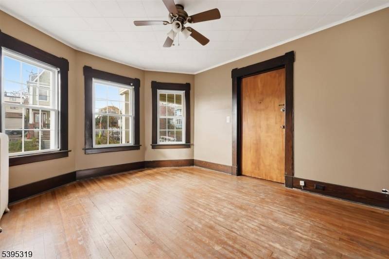 Welcome to this wonderfully spacious 3 family home in East Rutherford offering a stunning view of New York City !