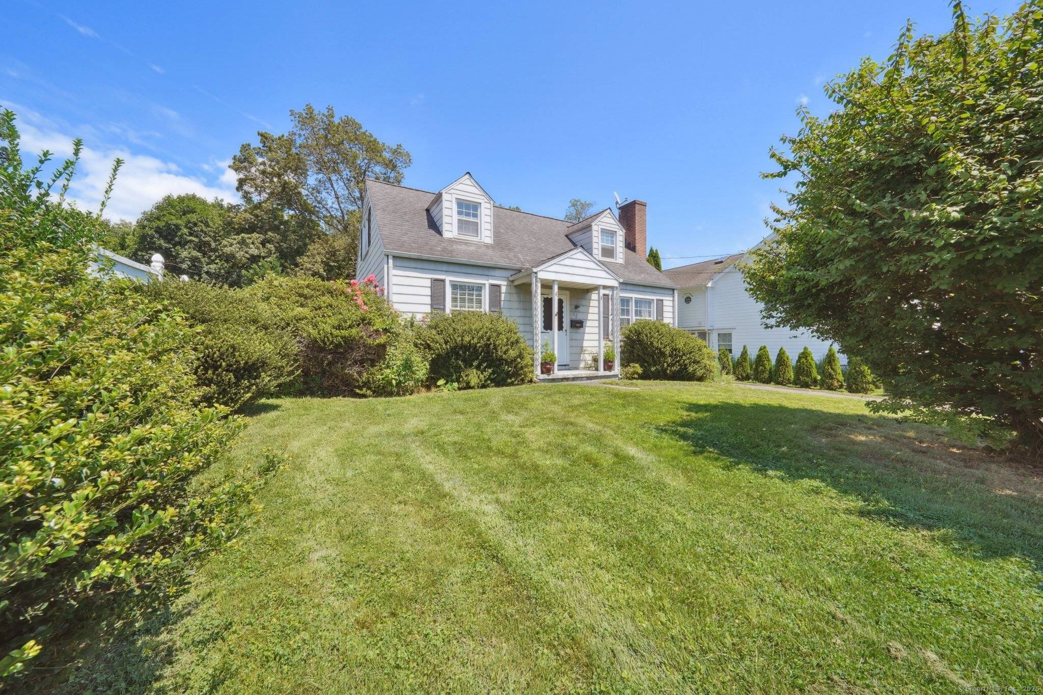 This charming Cape in the Cove offers convenient access to the beach, and a large inviting back yard provides potential for expansion.