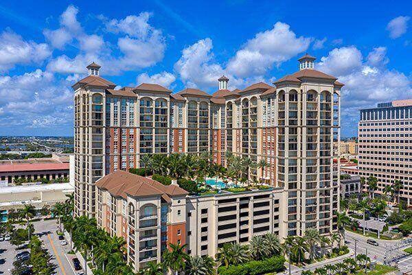 This rarely available ground floor walk out residence offers the perfect blend of privacy, accessibility, and luxury in the heart of downtown West Palm Beach.