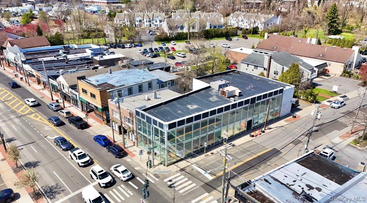Located on a high traffic corner in the heart of Smithtown, this standout commercial property offers exceptional visibility and a commanding retail presence an ideal opportunity for investors or business ...
