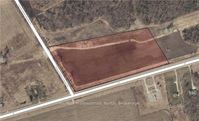 Located on the north side of County Road 90 between Barrie and Angus which road has recently been widened to 5 lanes to accommodate this high traffic area.