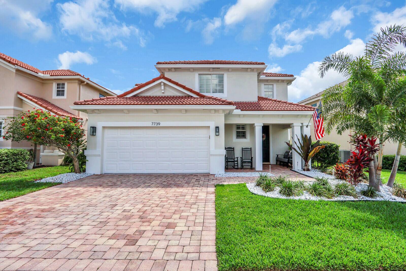 Beautiful lakefront home in the gated community, The Oaks.