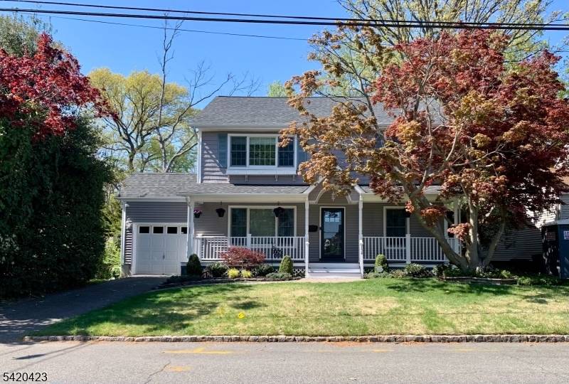 Exceptional style, privacy, and setting define this beautifully updated Colonial in Cranford's sought after Indian Village.