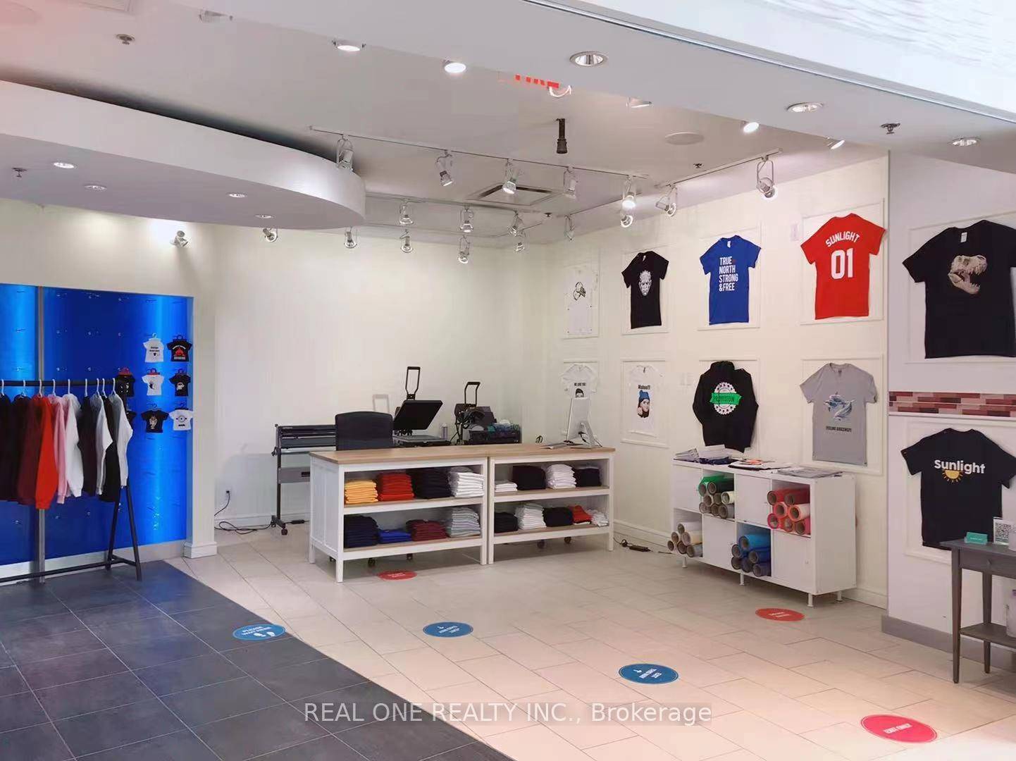 This profitable print on demand shop in a Thornhill mall specializes in custom apparel and also offers printing on items like keychains, mugs, bottles, and bags.