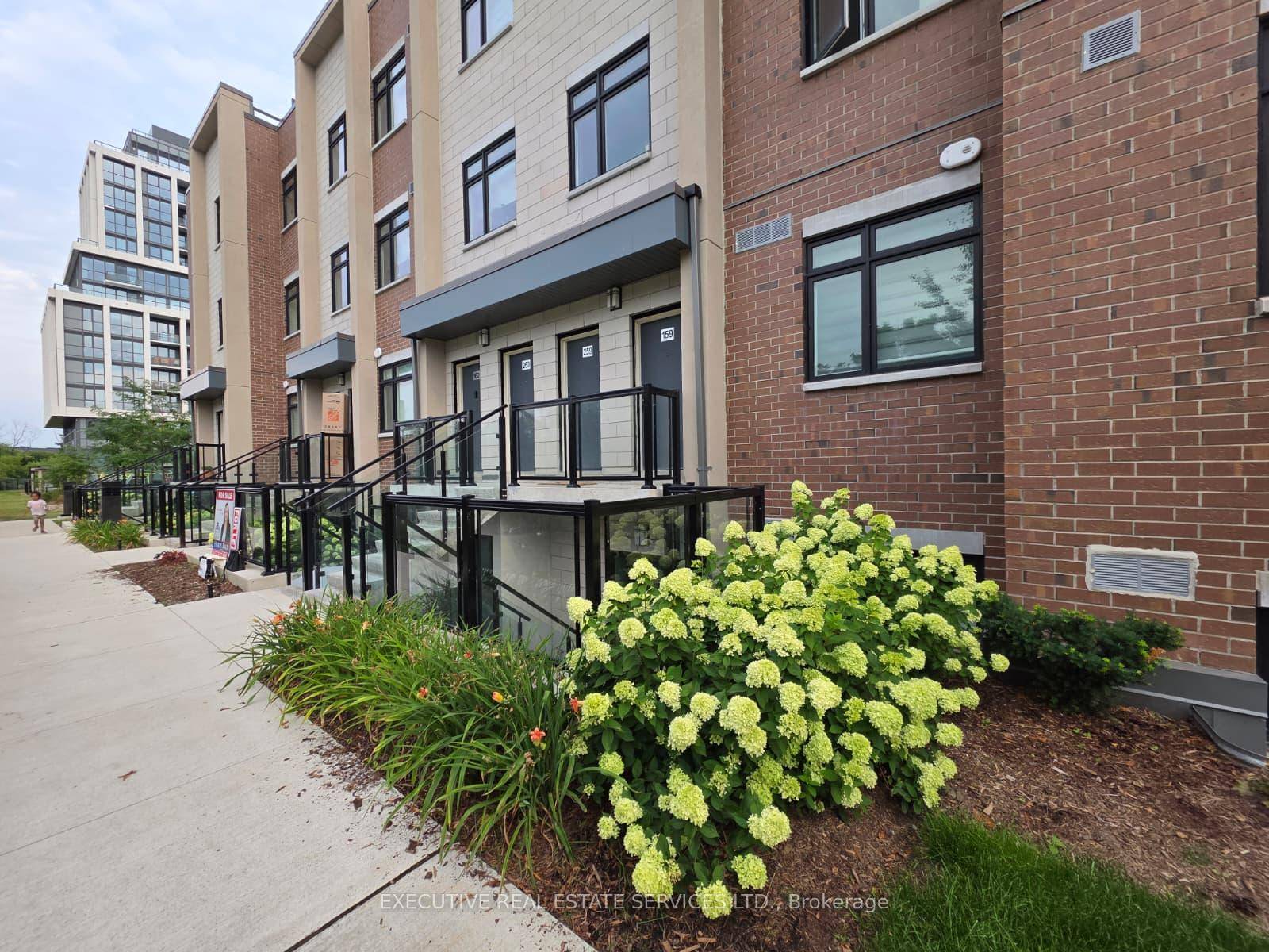 Stunning 1 Bedroom Den, 2 Full Baths Luxury Stacked Townhouse Condo in Lakeview Mississauga.