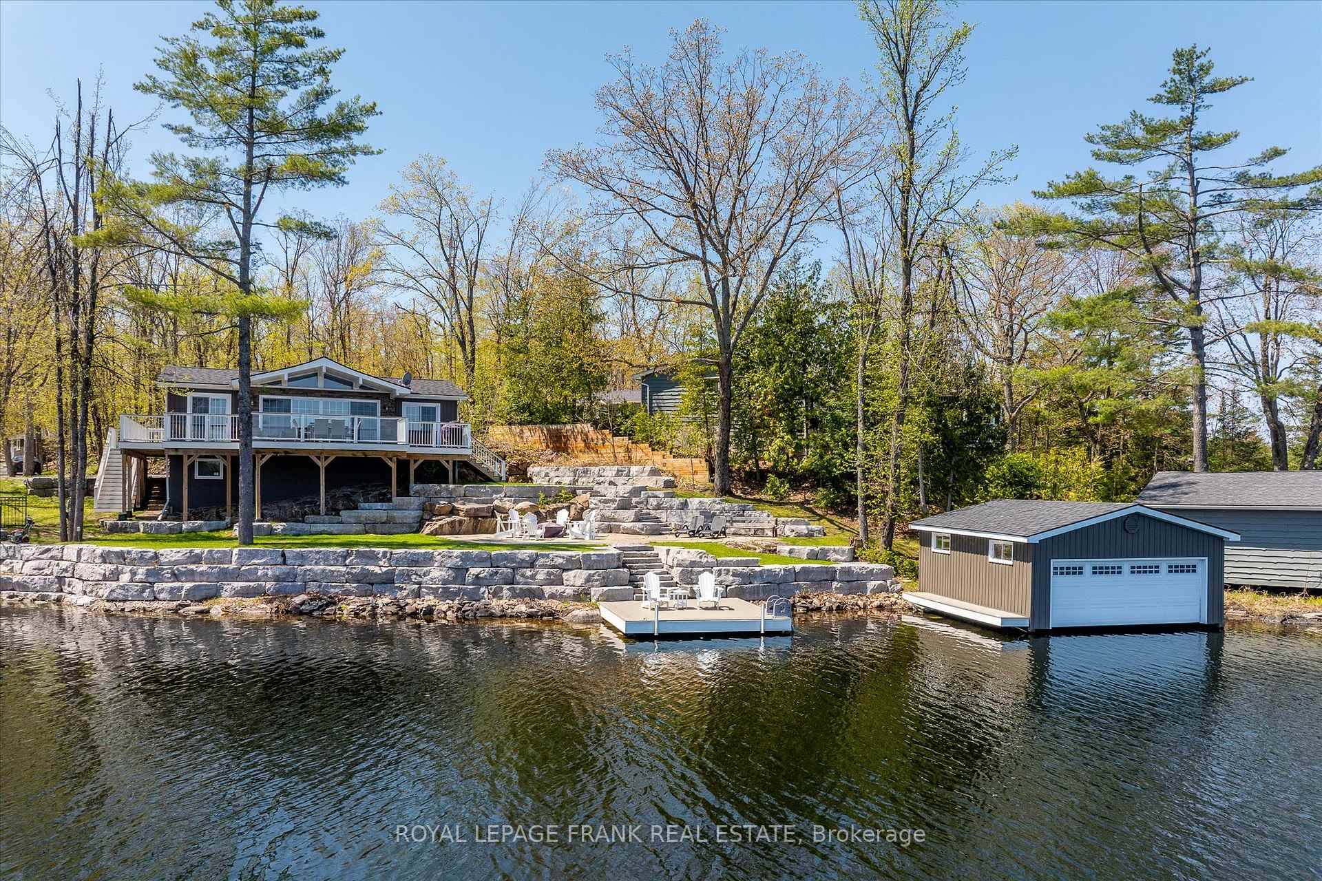 Big Bald Lake. This beautiful, four season lake house has deep, clean swimming frontage, an absolutely amazing open lake and island view and is turn key.