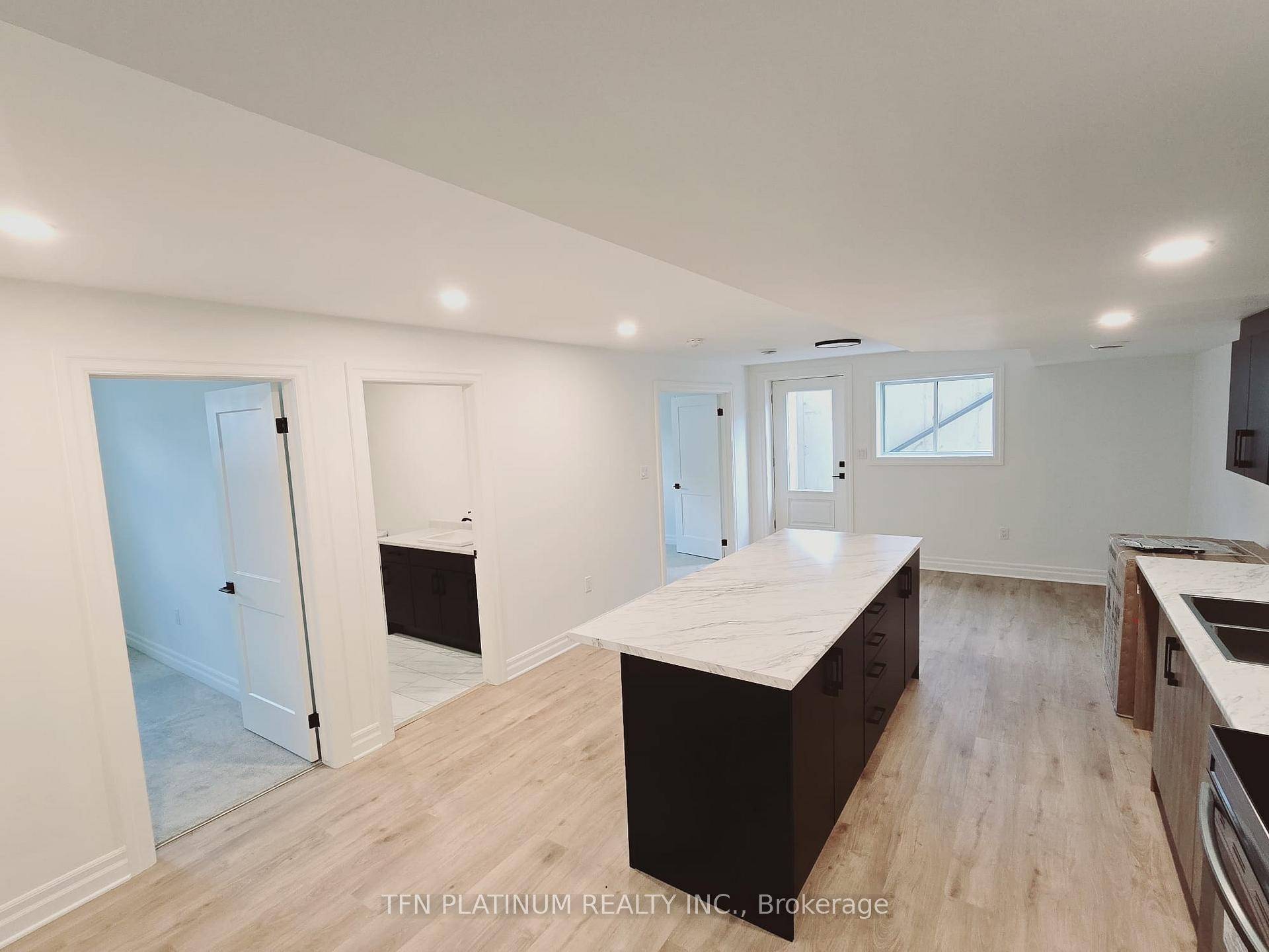 2 bedroom, 4 piece bath private basement unit features a kitchen that's a chef's delight, complete with elegant countertop and a huge functional island, perfect for quick meals orLockbox for ...