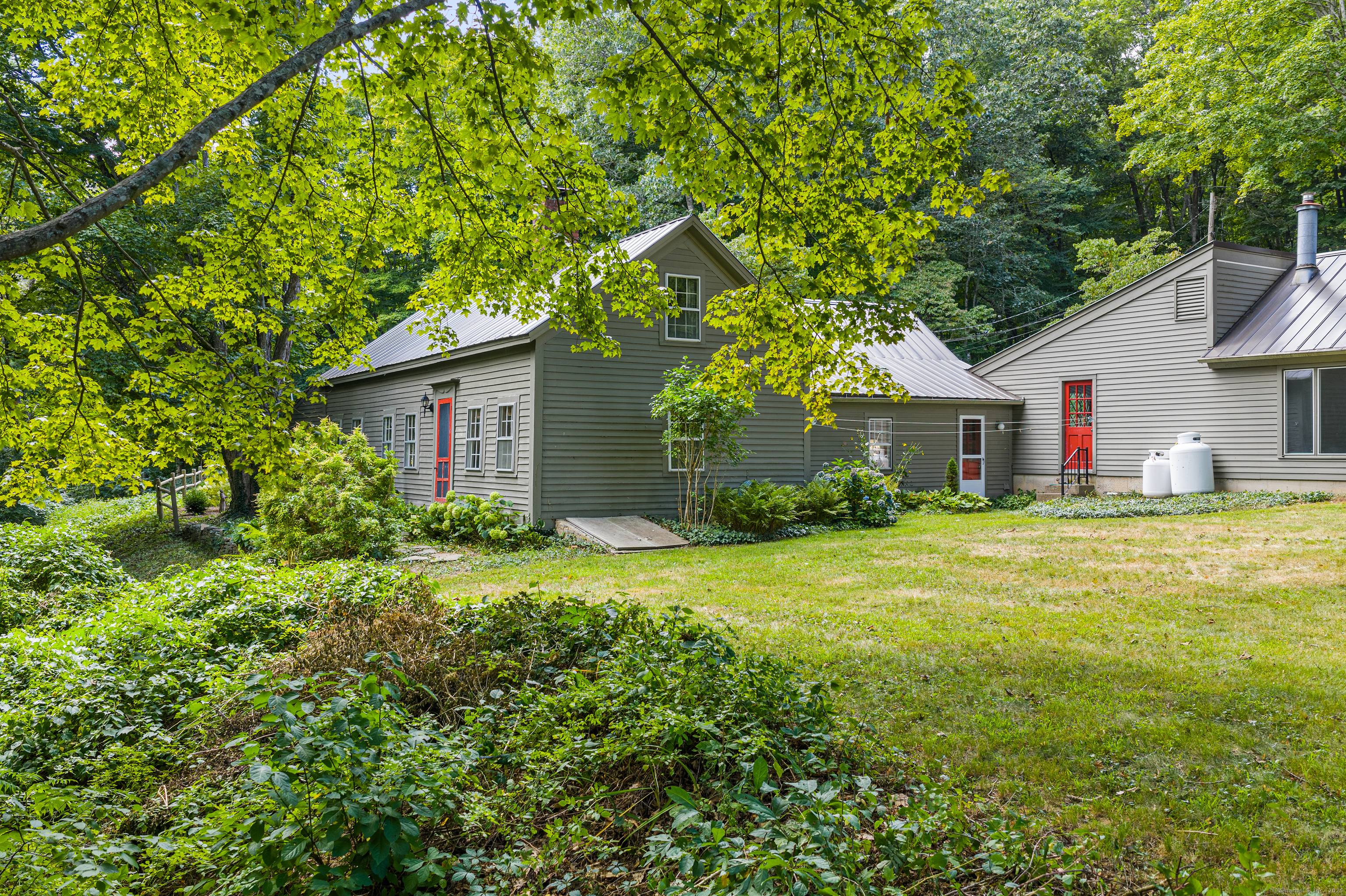 This unique property offers a spacious 3 bedroom, 2 bath main home along with a completely renovated 2 bedroom in law apartment, making it perfect for guests or rental potential.