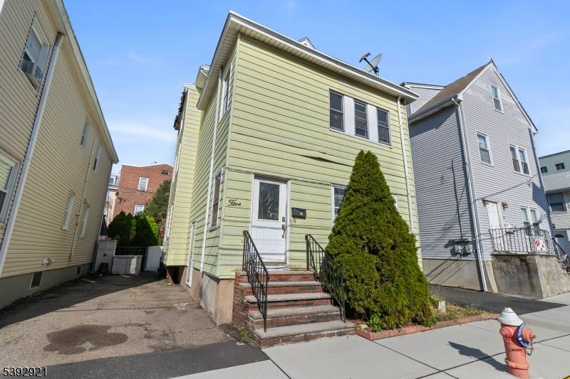Welcome to 5 Edison Place, a versatile multi family home in the heart of East Rutherford, offering flexibility and value in a prime location.
