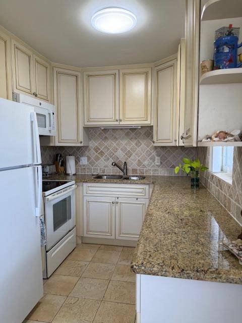 Beautiful updated 2nd floor corner unit.