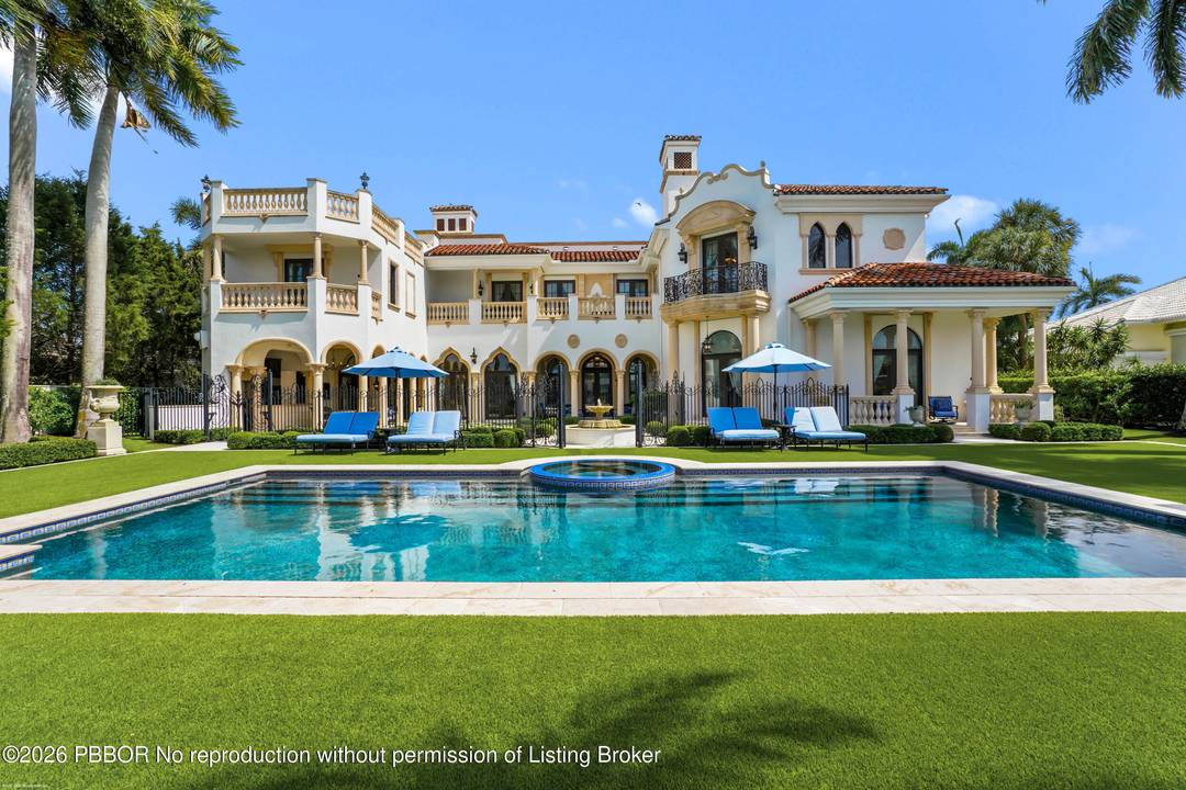 This extraordinary estate at 370 Eagle Drive feels like a Beverly Hills or Palm Beach mansion brought to Admirals Cove.