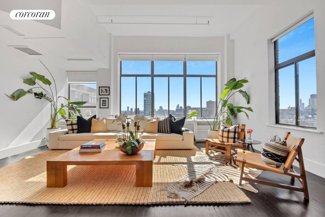 Perched atop the 11th floor of an iconic cast iron loft building overlooking quiet Lafayette Street, this mint penthouse with stunning protected views blends historic charm with modern luxury.