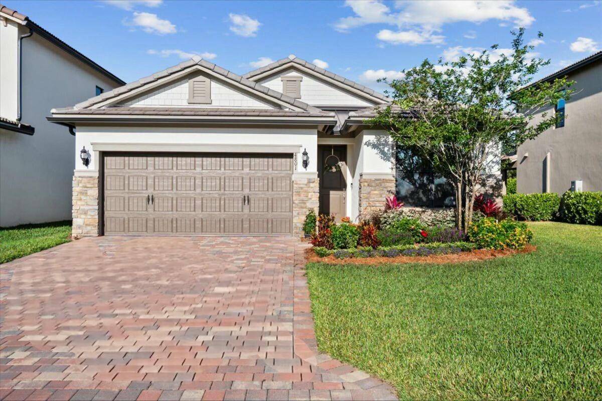 STUNNING 2023 built home in the sought after gated community of The Fields.