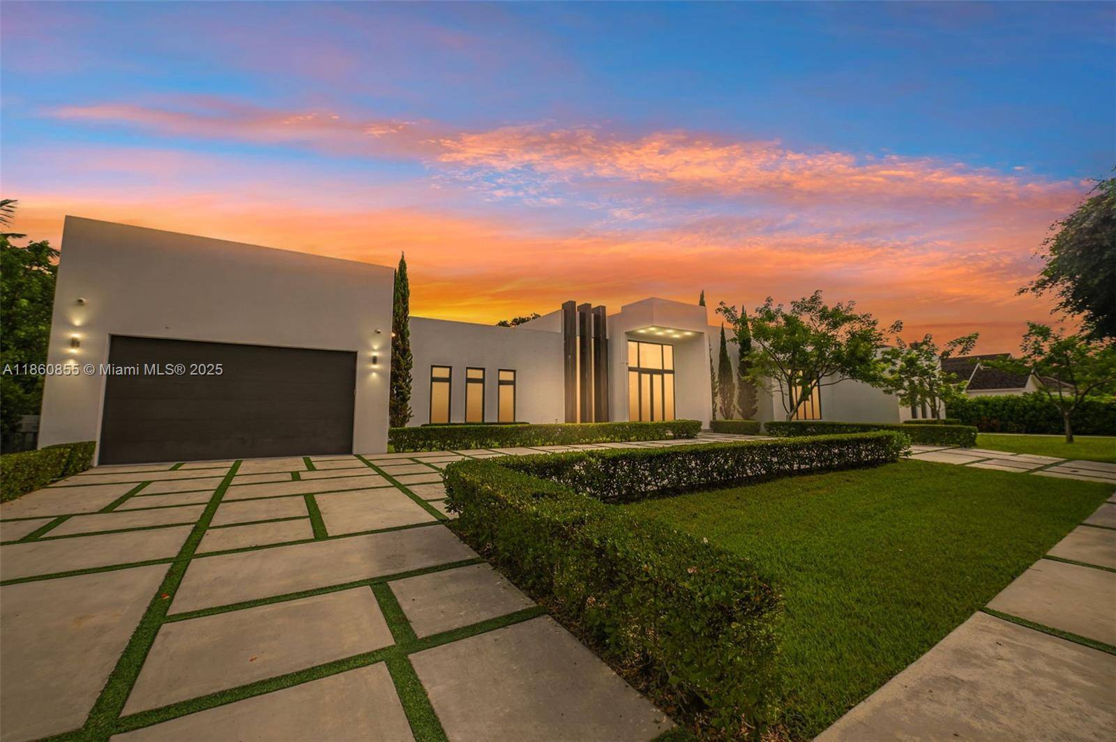 The Ultimate Modern Luxury Resort Style Residence Flooded with natural light, this stunning 2020 built one story home offers the perfect blend of elegance and comfort.