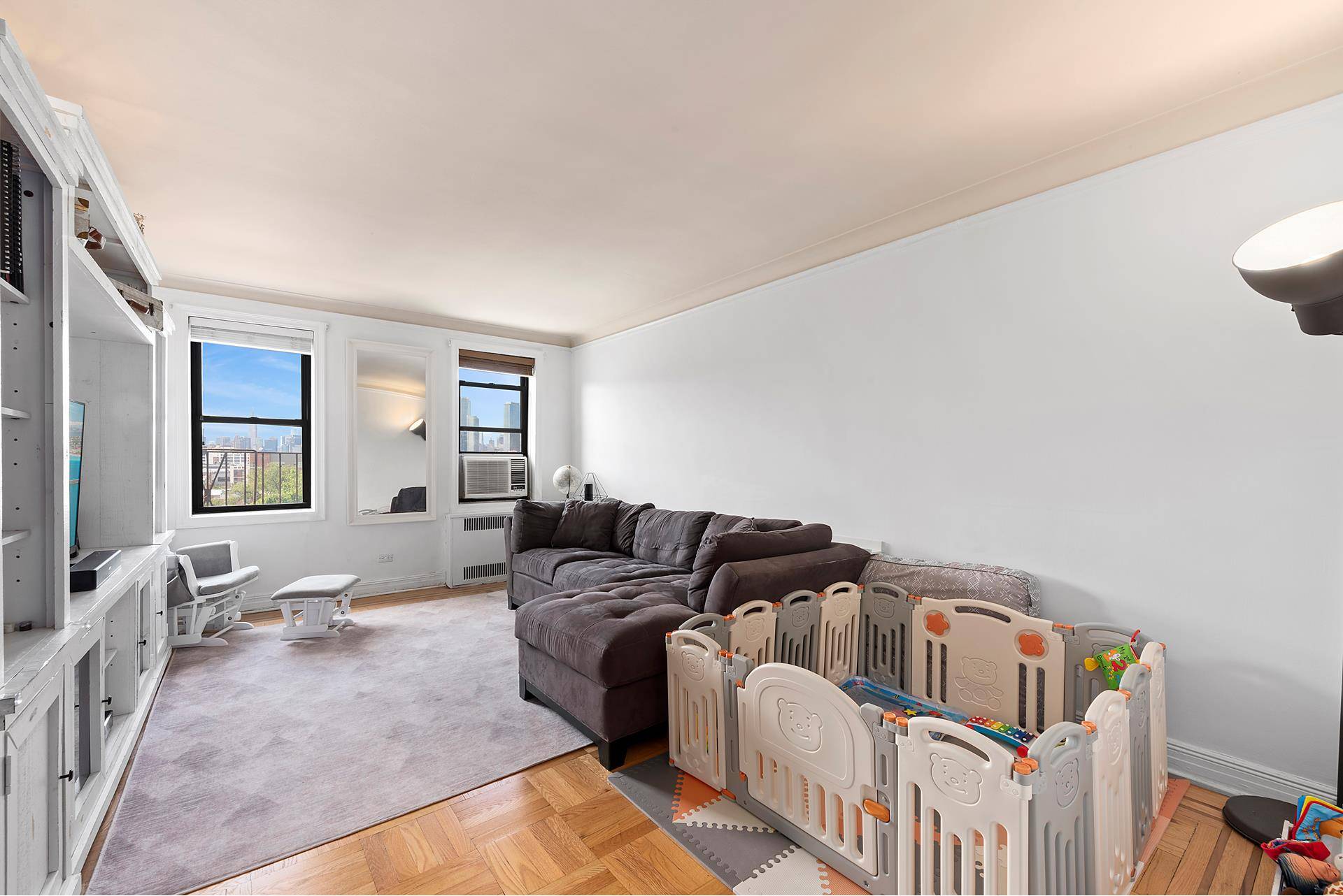 Step into this stunning, oversized, mint condition two bedroom apartment situated on a pristine tree lined street one block from the 40th Street 7 train.