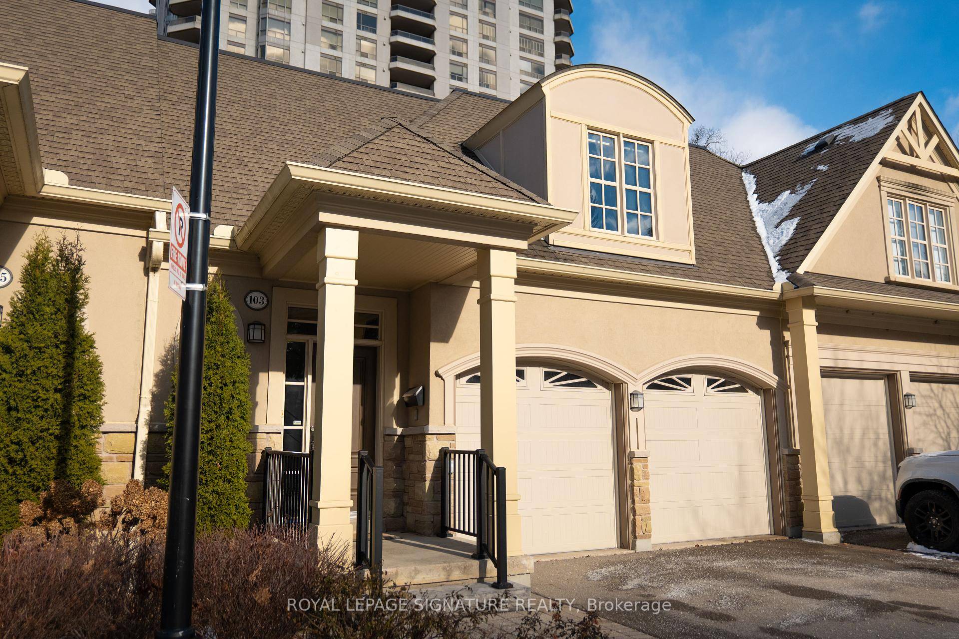 Elegant condo townhouse with a bright open concept design and vaulted Great Room leading to a spacious deck overlooking a private garden.