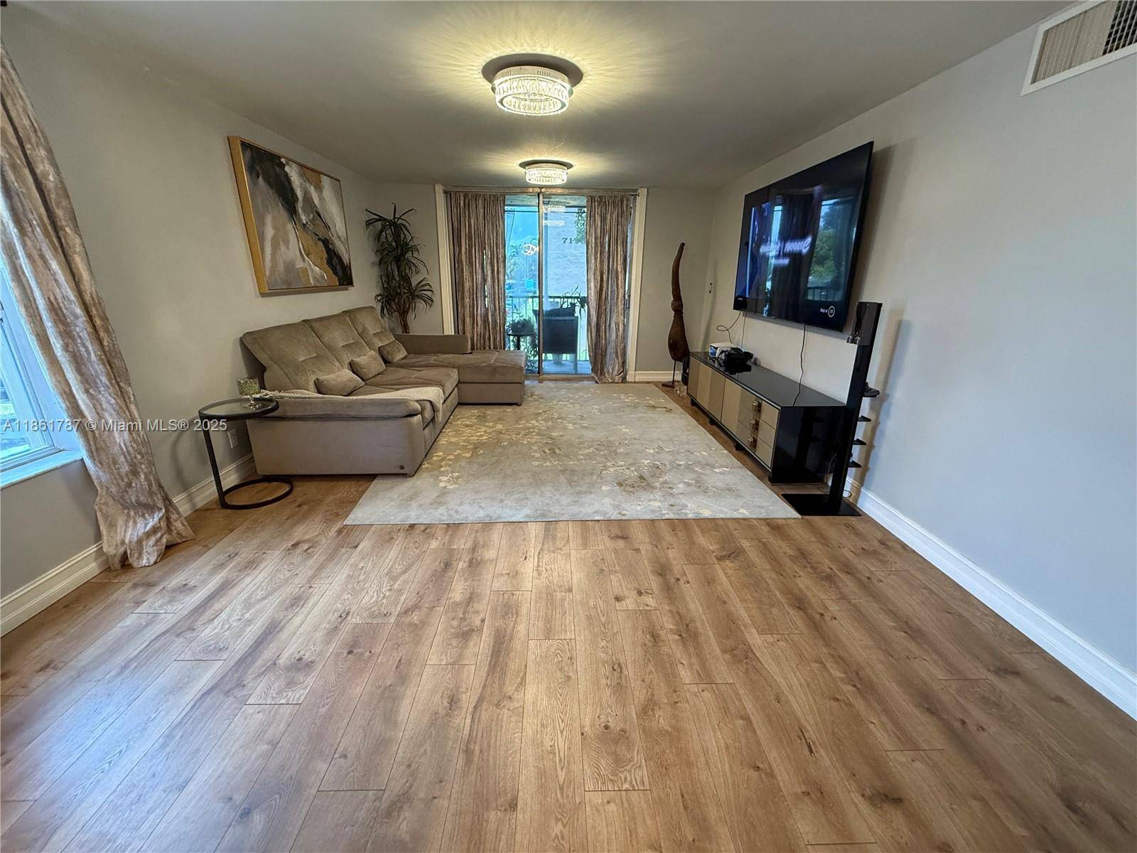 Step into this spacious corner unit, perfectly situated in the highly desirable Country Pines community.
