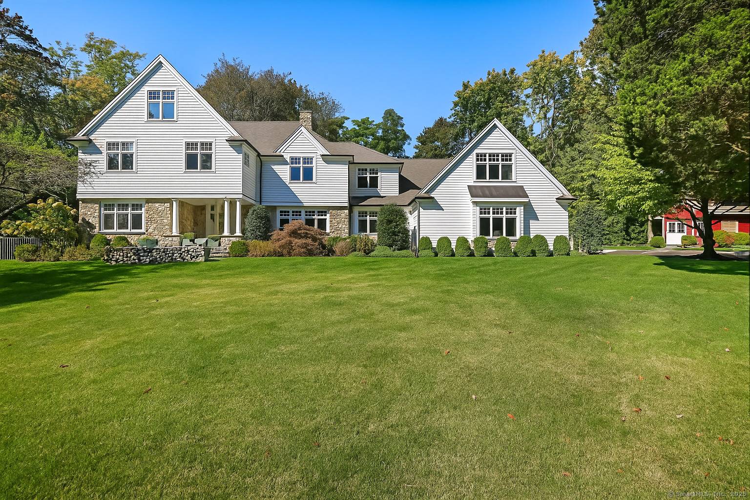 Located on a peaceful cul de sac yet just minutes from town, the train, and top rated schools, this stunning home offers the perfect balance of tranquility and convenience.
