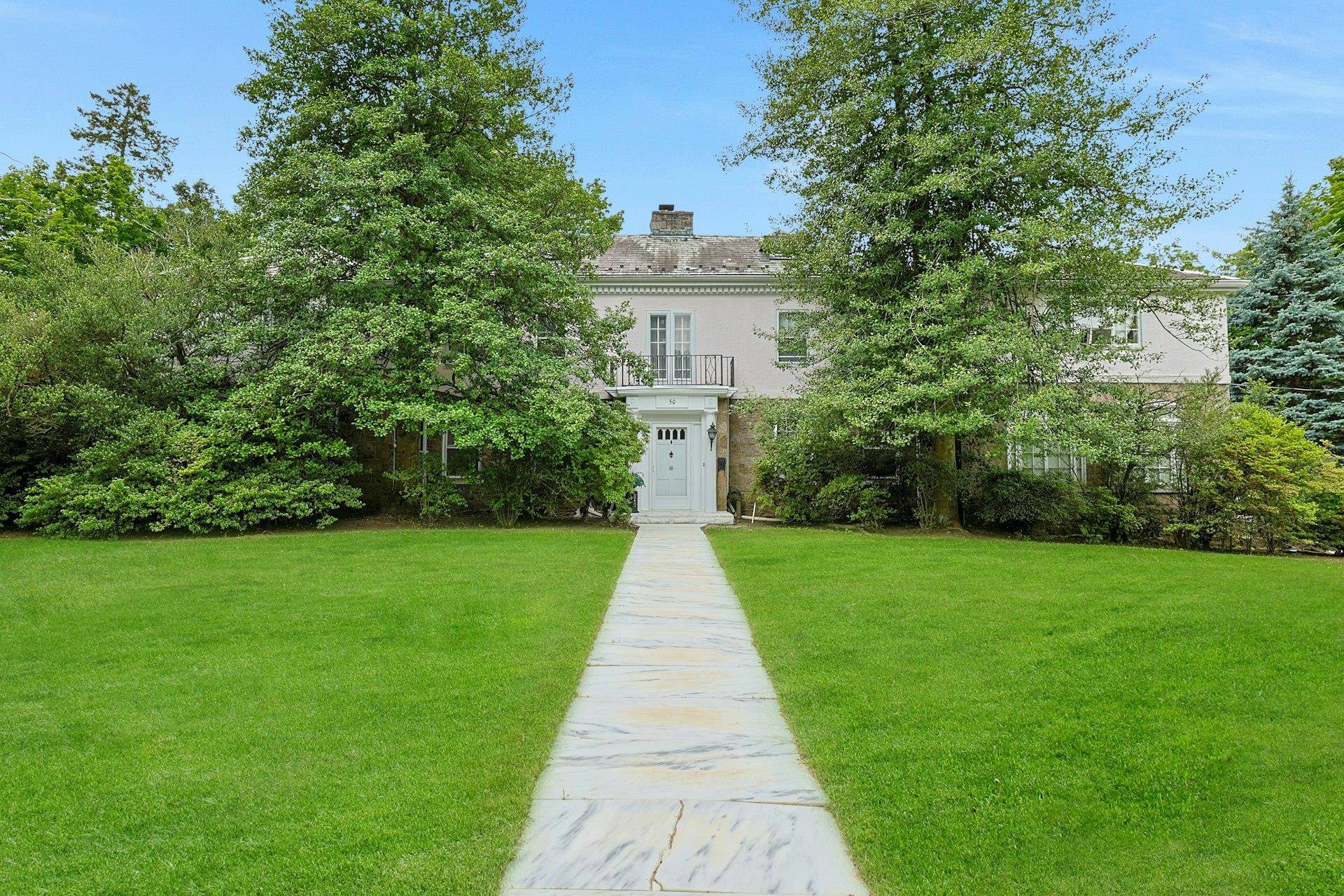 This stone amp ; stucco Center Hall Colonial has great flow, street presence and is a palette waiting for a fresh beginning.