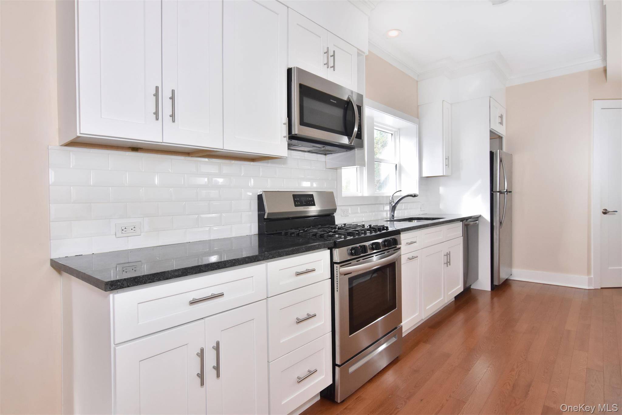 Bright amp ; Modern 2 Bedroom with High Ceilings Walk to Train amp ; Restaurants Step into this sun drenched, turn key 2 bedroom apartment offering nearly 1, 300 sq ...