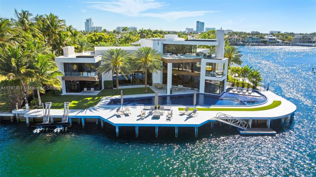 Welcome to the pinnacle of luxury in prestigious Harbor Beach, a guard gated waterfront community offering ultimate privacy and exclusivity.